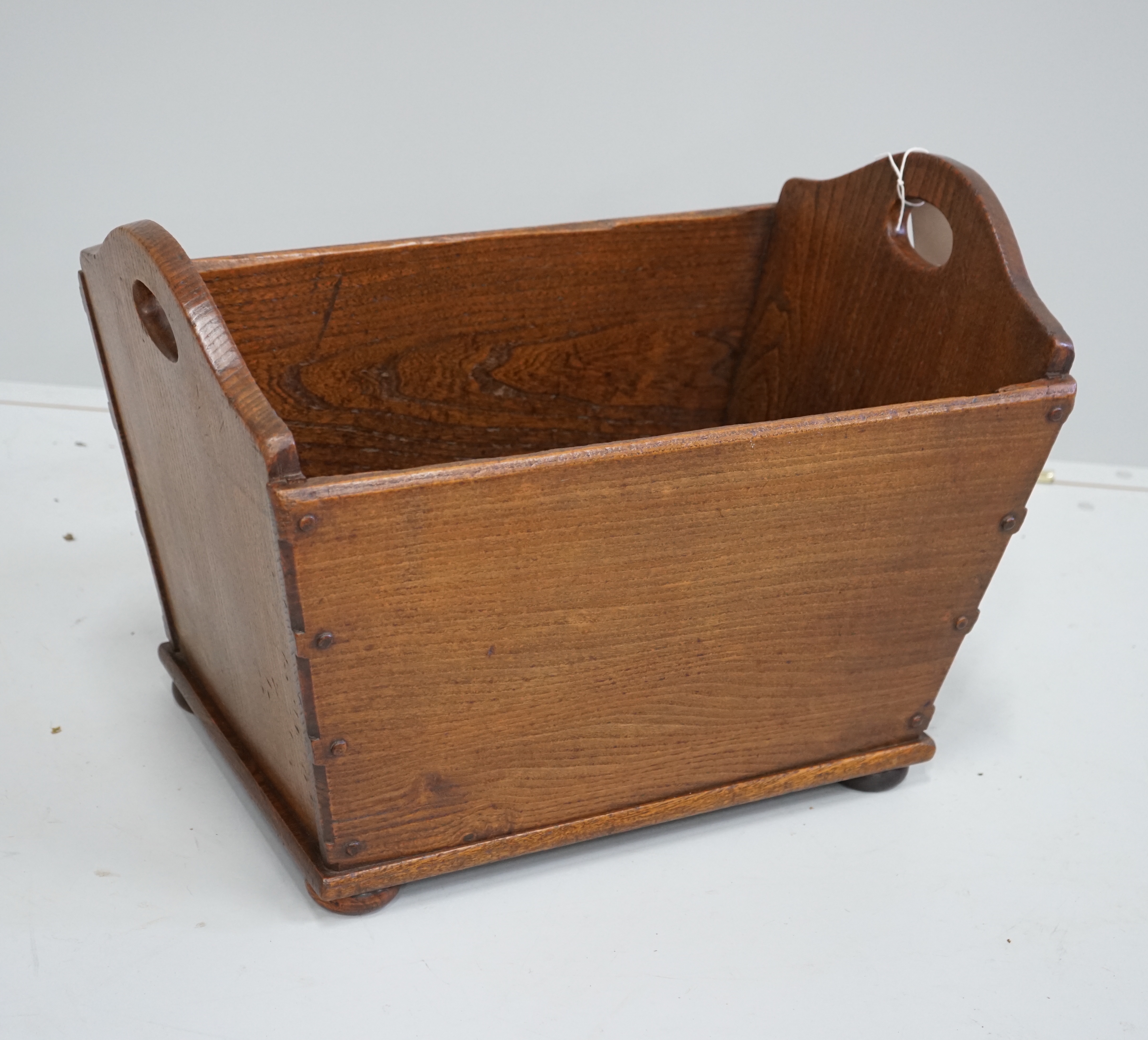 A Russian moulded red acrylic mantel timepiece, width 19cm, and a Secessionist style beech cased timepiece